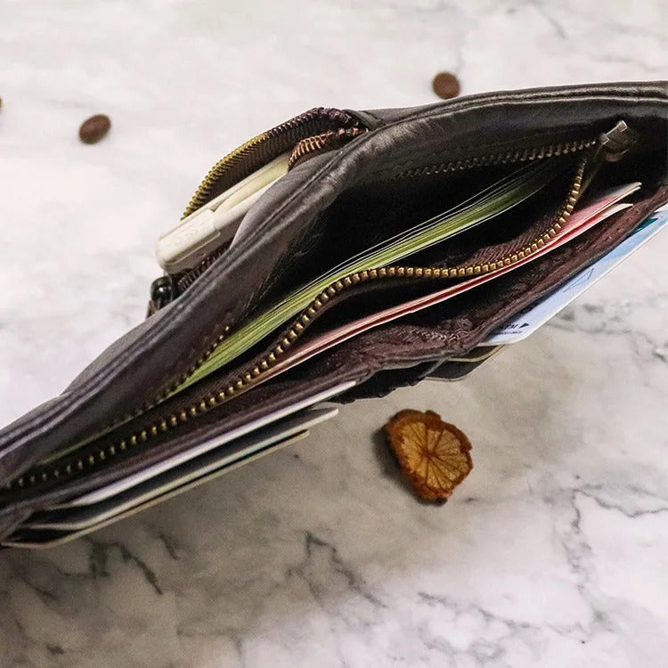 Gift for him: Durable men's vintage leather bifold wallet. Slim design, rugged feel, timeless accessory.
