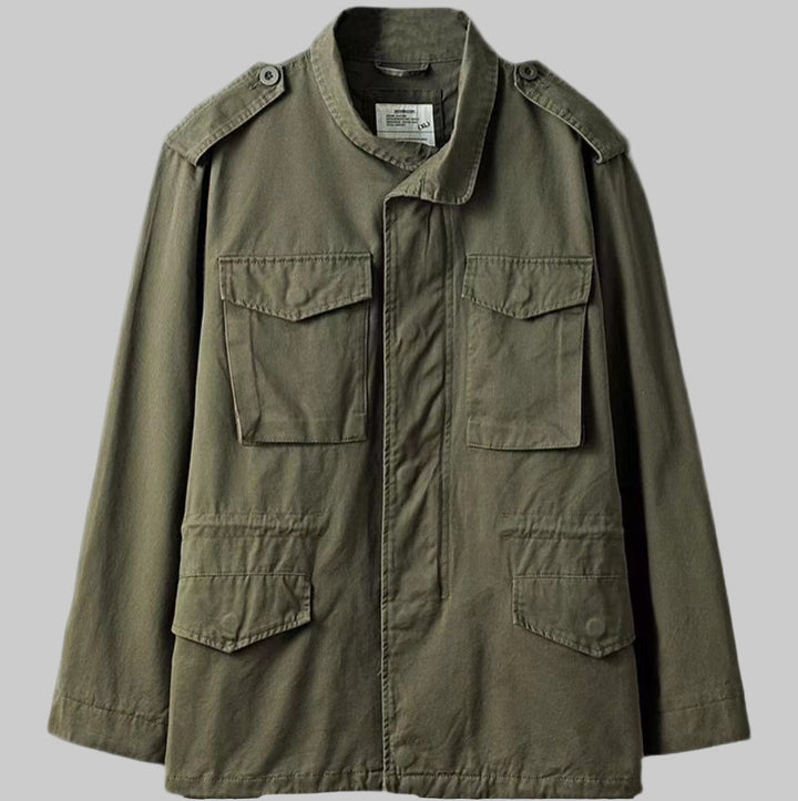 Rugged men's vintage military field jacket, ideal for casual wear & all-season outdoor style. Durable outerwear.