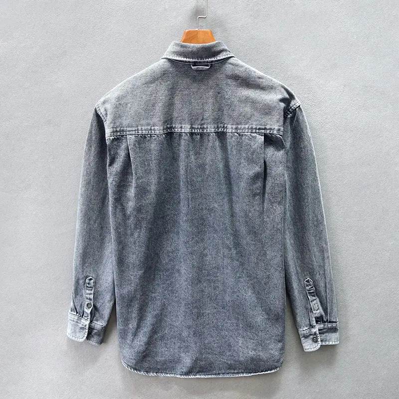 Classic men's stone-washed button-down shirt with a relaxed fit, featuring vintage style and long sleeves.