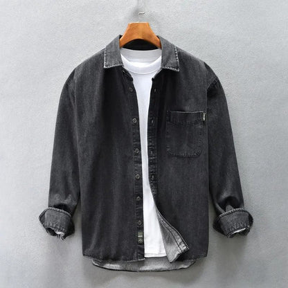 Stylish blue stone-washed men's shirt with a button-up front, offering a comfortable, casual, and vintage look.
