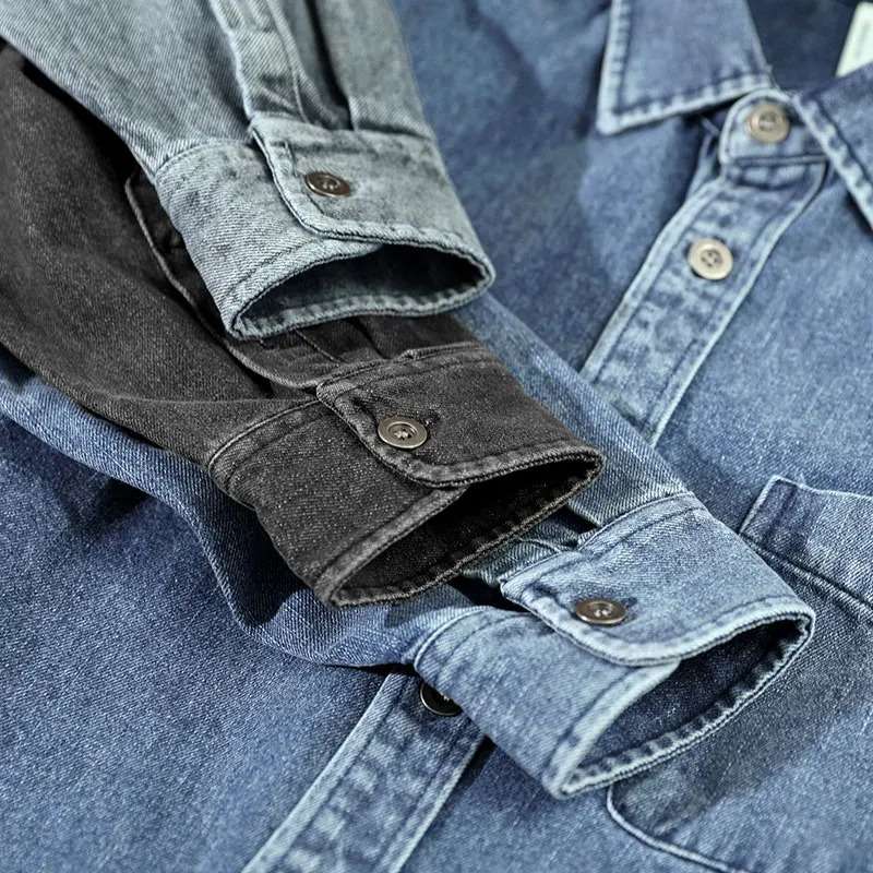 Gray vintage men's button-up shirt, stone-washed for a unique texture. Long-sleeve casual wear with relaxed fit.