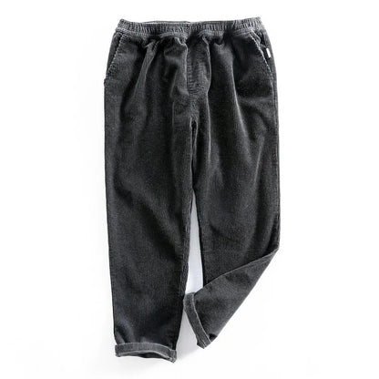 Green men's vintage style stretch casual pants, comfortable and relaxed fit. Ideal for everyday versatile wear.