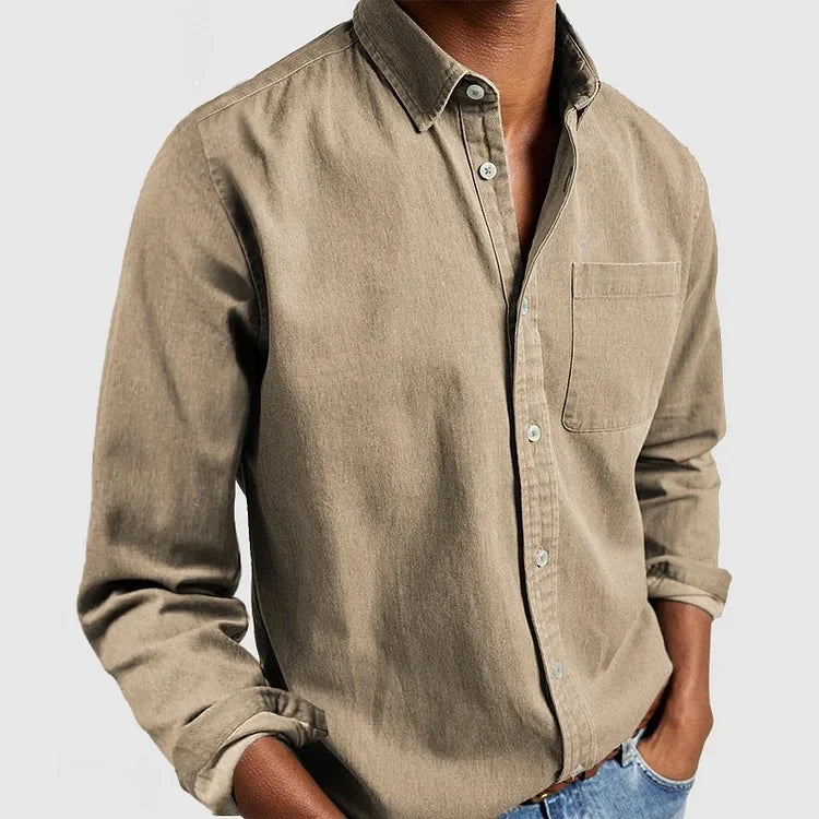 Casual men's long sleeve chambray shirt with vintage style button-up design, perfect for everyday fashion.