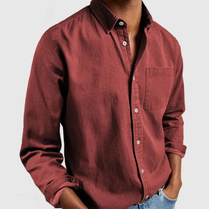 Classic men's long sleeve chambray button shirt, vintage look, relaxed fit, ideal for casual wear.