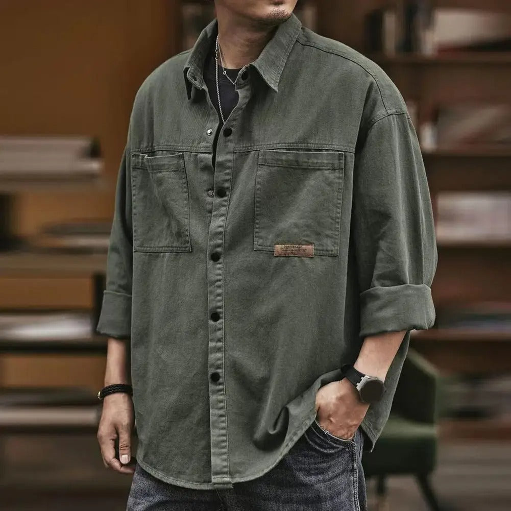 Comfortable cotton blend vintage men's button-up shirt with long sleeves, great for casual retro style.