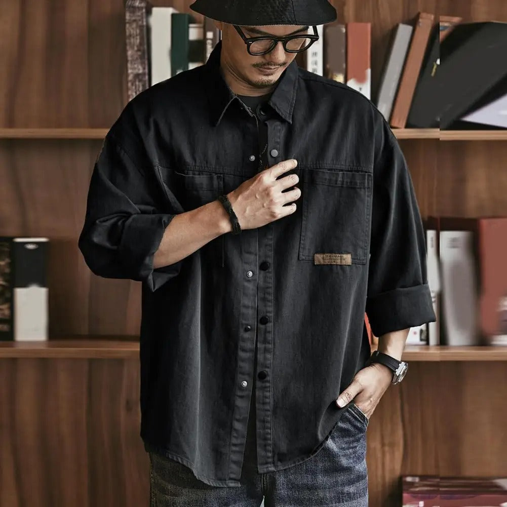 Casual men's vintage button-up shirt, long sleeve, cotton blend, a retro fashion essential.