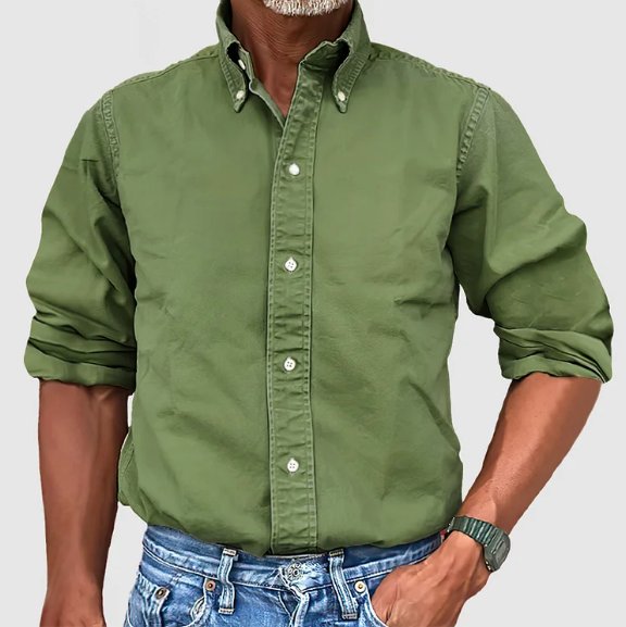 Close-up of men's vintage wash button-down shirt fabric, showcasing the long sleeve and quality details.