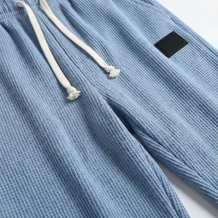 Casual loungewear knit pants for men, offering ultimate comfort and a relaxed fit style.