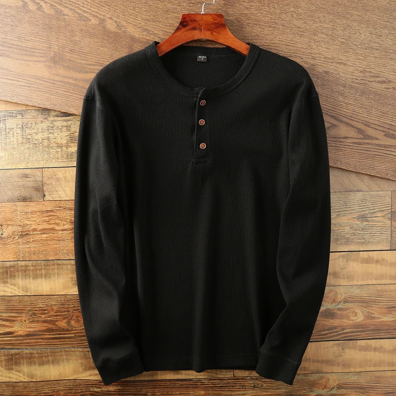 Modern men's waffle knit long sleeve crew neck shirt, offering stylish comfort for everyday wear.