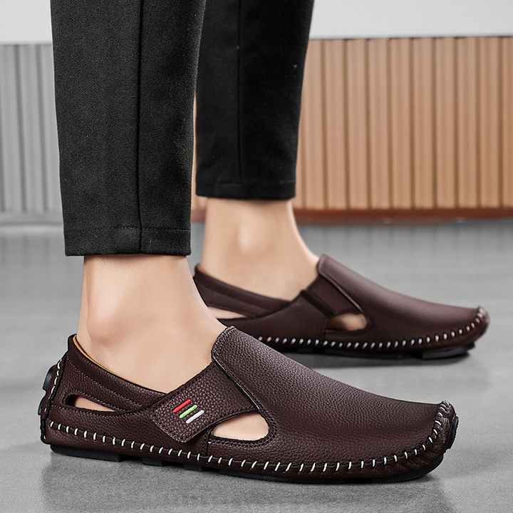 Side view of men's casual walking sandals with adjustable strap & cushioned footbed.