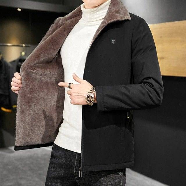 Men's warm black parka jacket with a faux fur collar, perfect for cold winter weather outerwear.