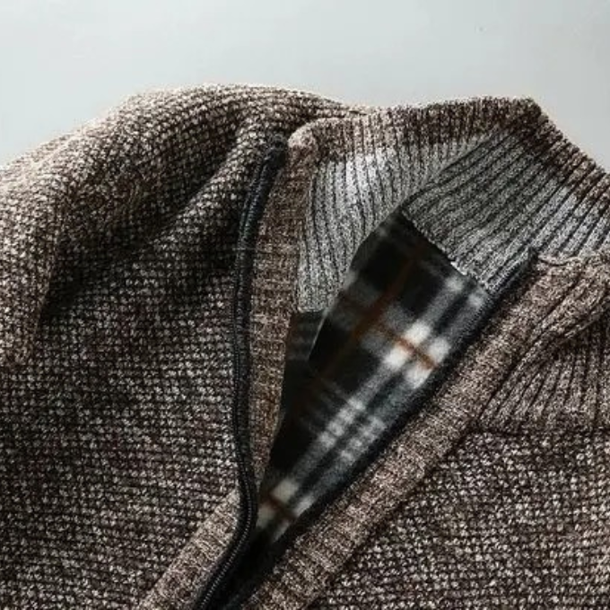 Premium men's Cumberland winter jacket, offering superior warmth & rugged elegance.