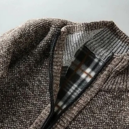 Premium men's Cumberland winter jacket, offering superior warmth & rugged elegance.