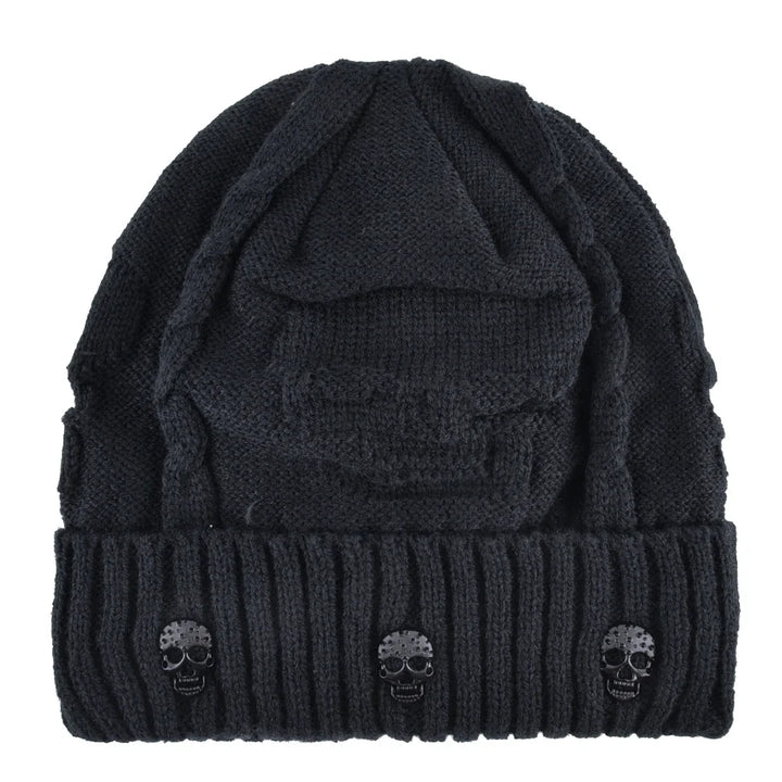 Black men's warm knit skull cap beanie, an edgy winter hat with striking metallic accents. Stylish men's accessory.