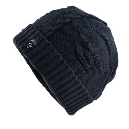 Warm men's knit beanie, a stylish skull cap for winter. Features unique metallic accents for an edgy look.