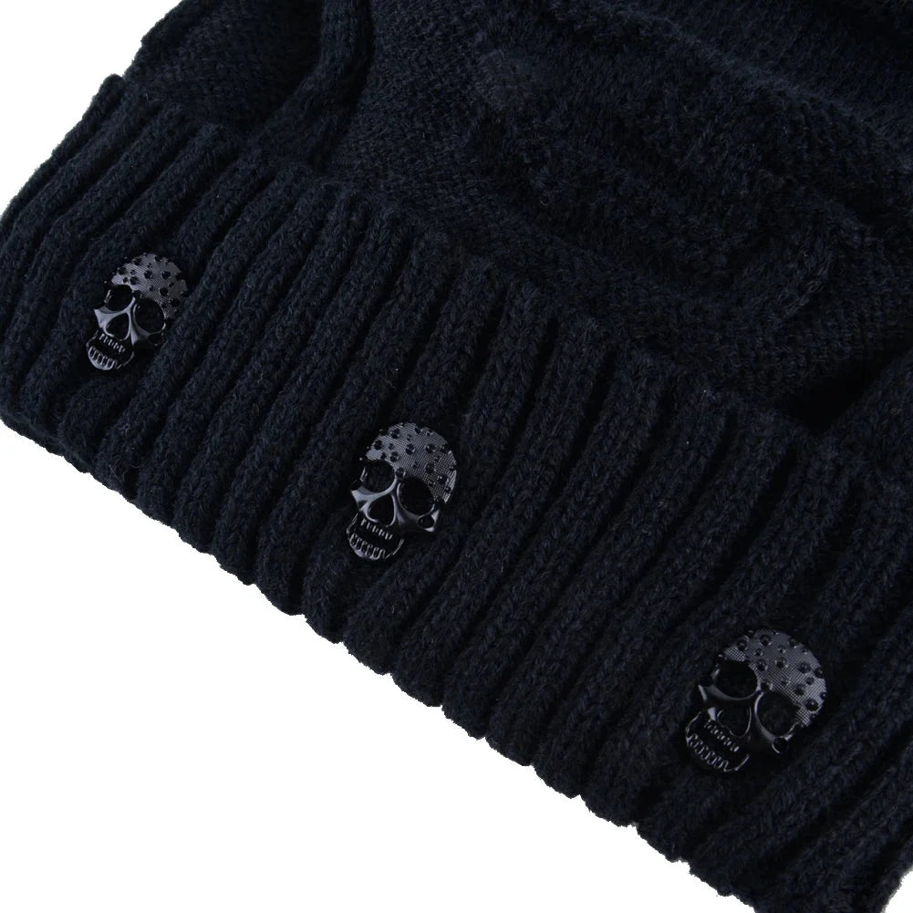 Knit men's skull cap beanie, a warm winter accessory. Metallic accents add an edgy, modern touch.