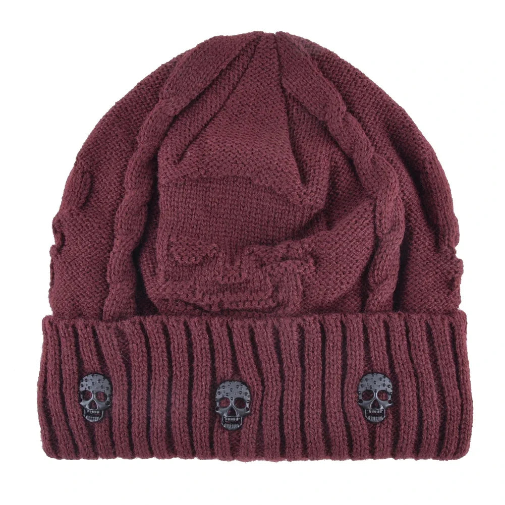 Comfortable, warm men's knit beanie skull cap. Features cool metallic accents, perfect for an edgy winter style.
