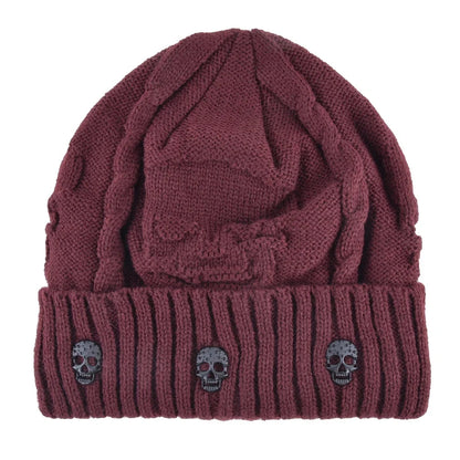 Comfortable, warm men's knit beanie skull cap. Features cool metallic accents, perfect for an edgy winter style.