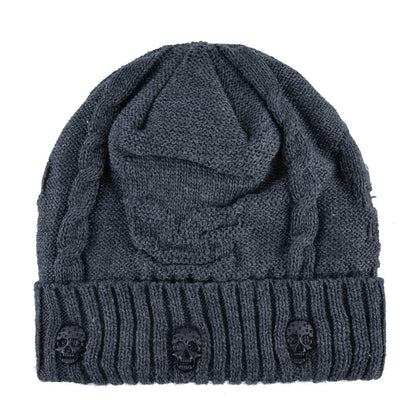 Modern men's warm knit skull cap. This beanie features metallic accents, offering an edgy style for winter.