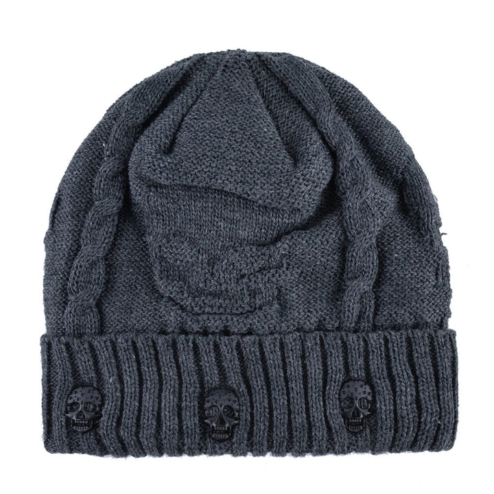 Modern men's warm knit skull cap. This beanie features metallic accents, offering an edgy style for winter.