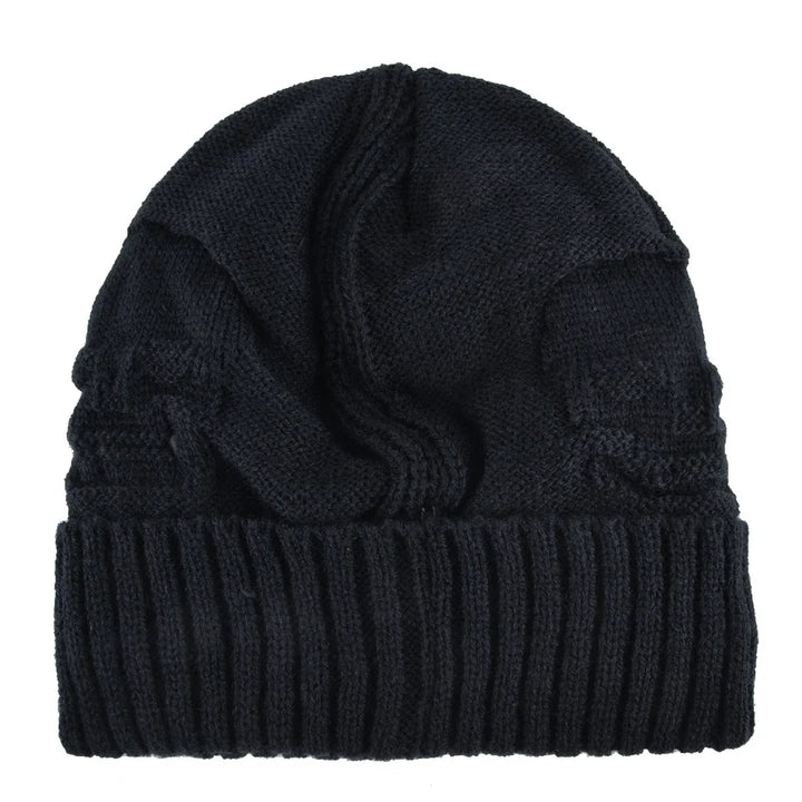 Versatile men's warm knit skull cap beanie with unique metallic accents. Essential winter hat for edgy looks.