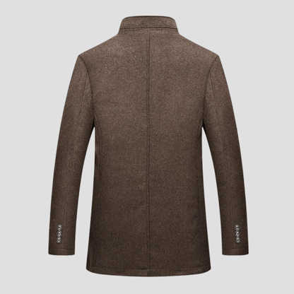 Stylish men's navy blue quilted stand collar casual winter coat for cold weather.