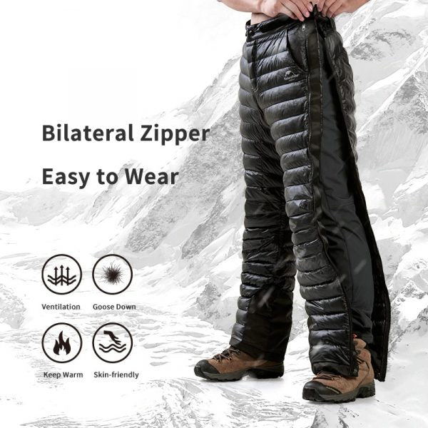 Durable men's expedition thermal down pants with leg zippers, excellent for extreme cold weather & snow sports.