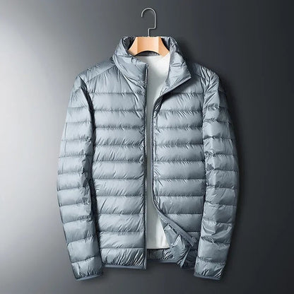 Warm & water-resistant men's insulated jacket. Lightweight thermal outerwear for active cold weather adventures.