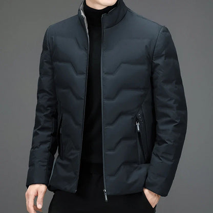 Warm men's winter puffer jacket, quilted design provides ultimate warmth for cold weather. Practical zipper pockets.