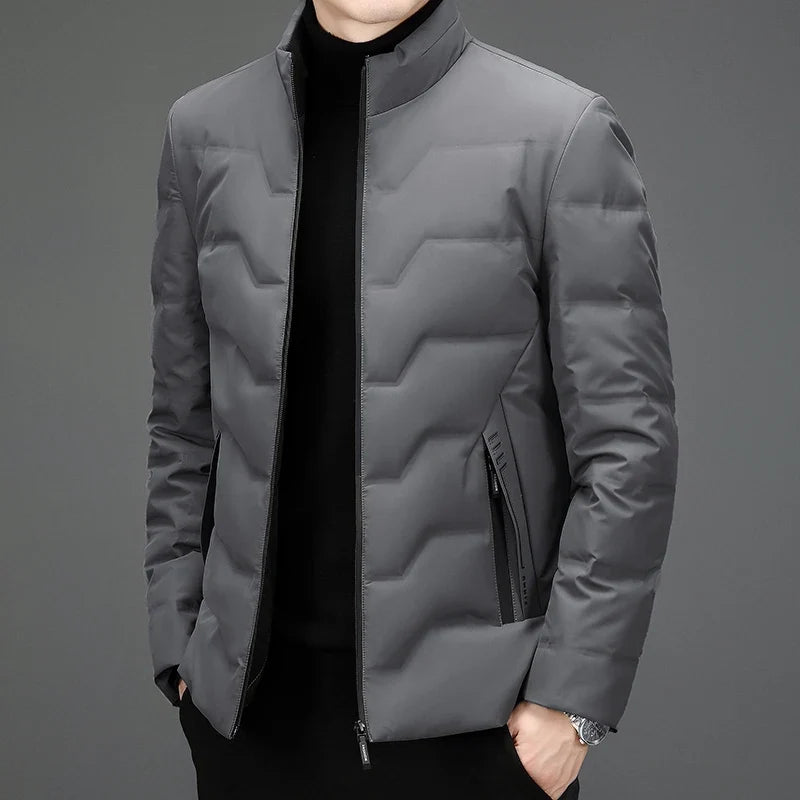 Men's fashionable winter puffer coat. Lightweight & warm quilted jacket, perfect outerwear for cold weather conditions.