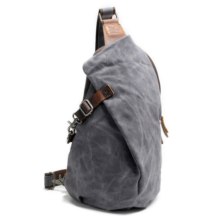 Stylish canvas anti-theft men's crossbody bag, water-resistant for daily urban adventures.