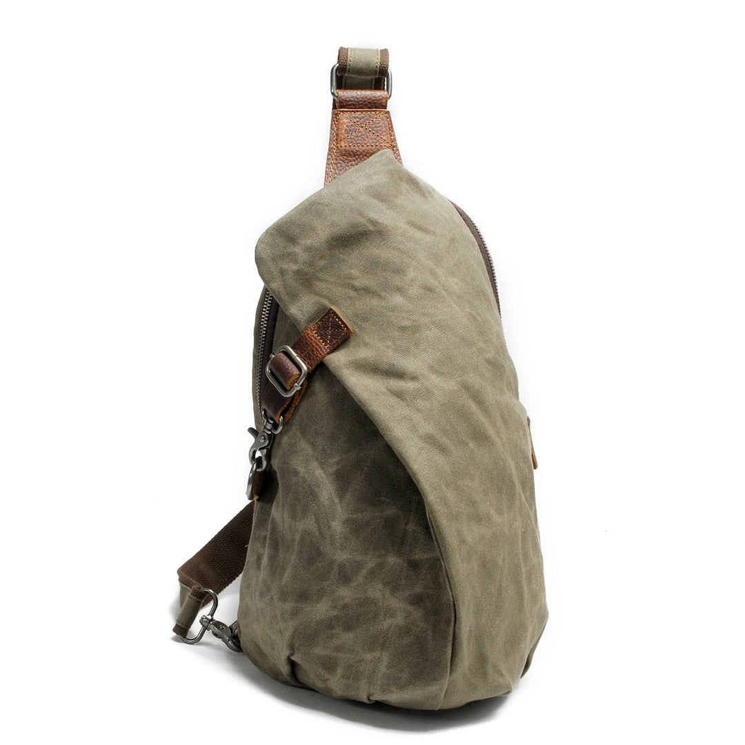 Durable canvas anti-theft sling bag for men, water-resistant & secure travel accessory.