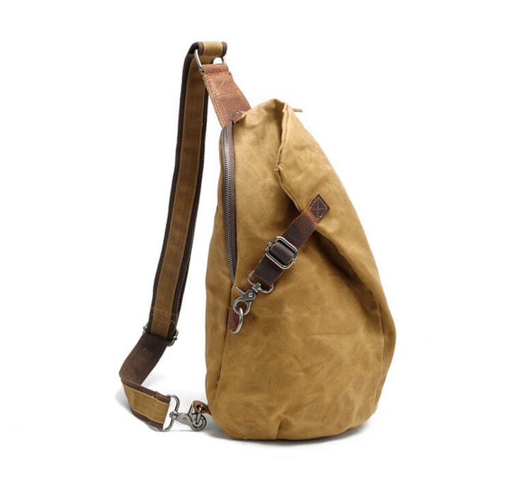 Water-resistant men's crossbody bag, protecting essentials from elements; anti-theft design.