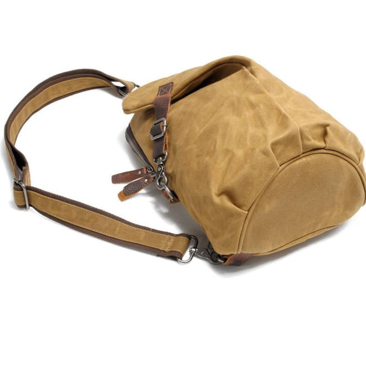 Back view of men's anti-theft crossbody, showing adjustable strap & water-resistant canvas.