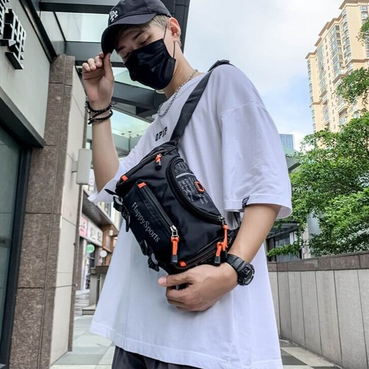 Active men's water-resistant sling bag, designed for secure and easy access.