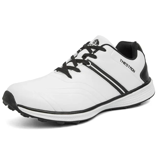 Sleek men's waterproof golf shoes, featuring advanced spike traction for optimal grip & powerful swing stability.