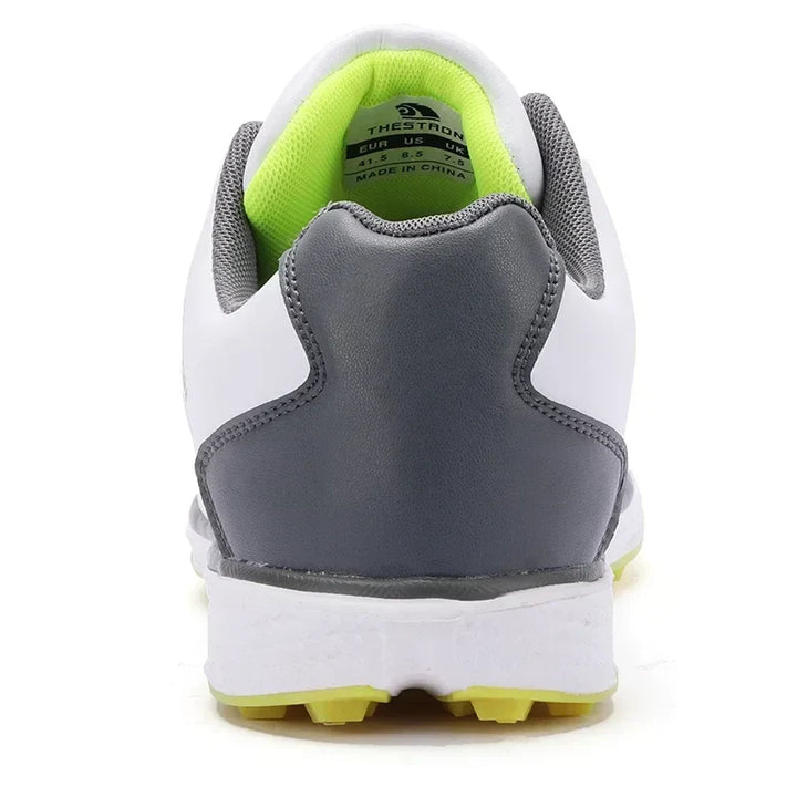Top view of men's performance golf shoes, waterproof, with visible spike traction for secure footing.