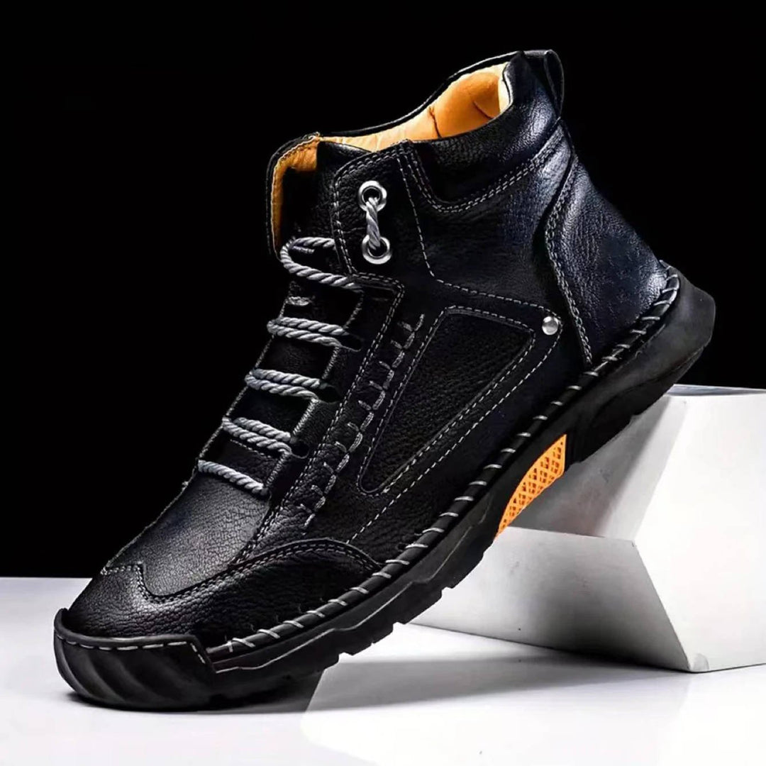 Grey men's waterproof hiking boots with arch support. Perfect for trails.