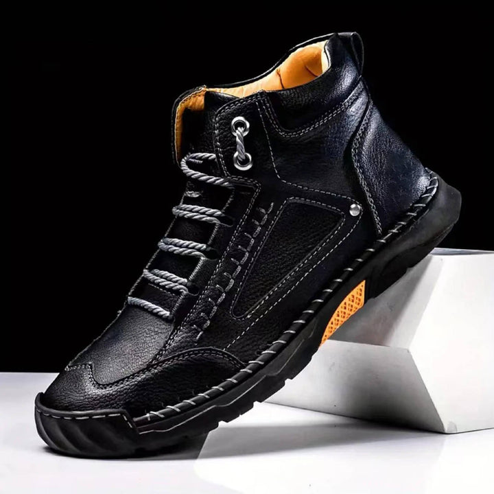 Grey men's waterproof hiking boots with arch support. Perfect for trails.