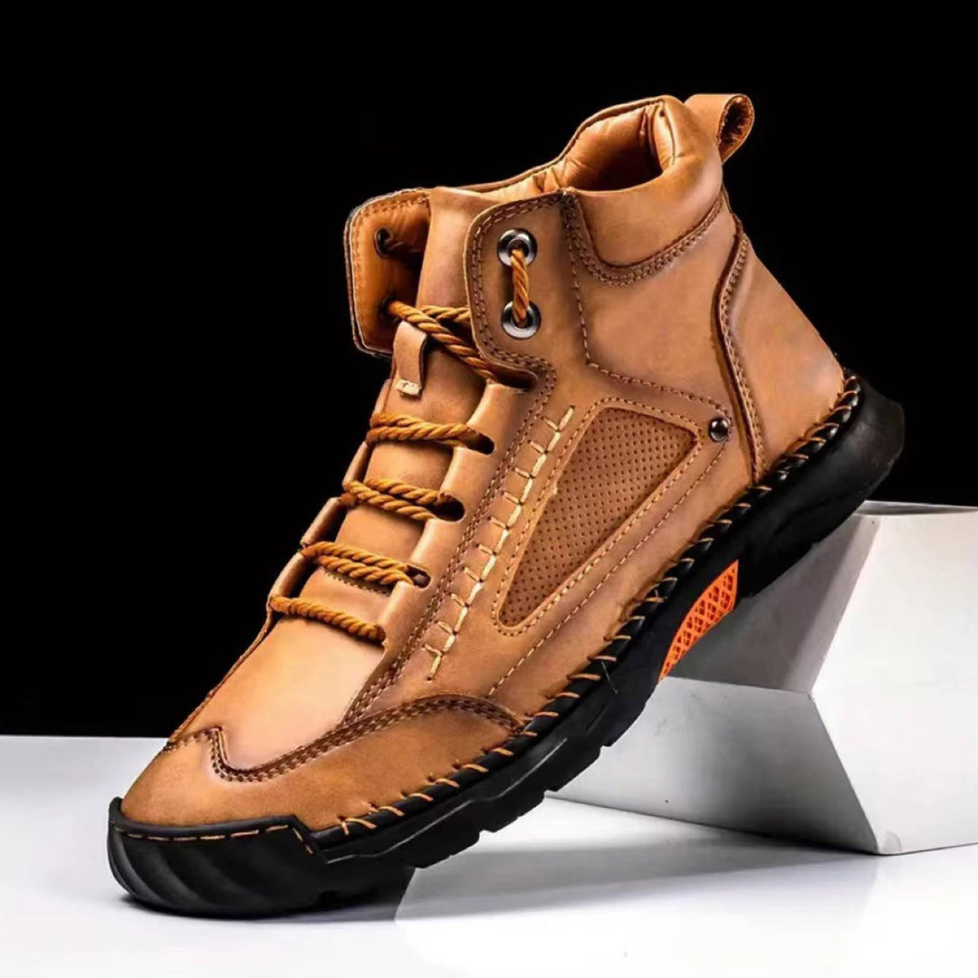 Close-up: Men's waterproof walking boots with strong arch support for stability.