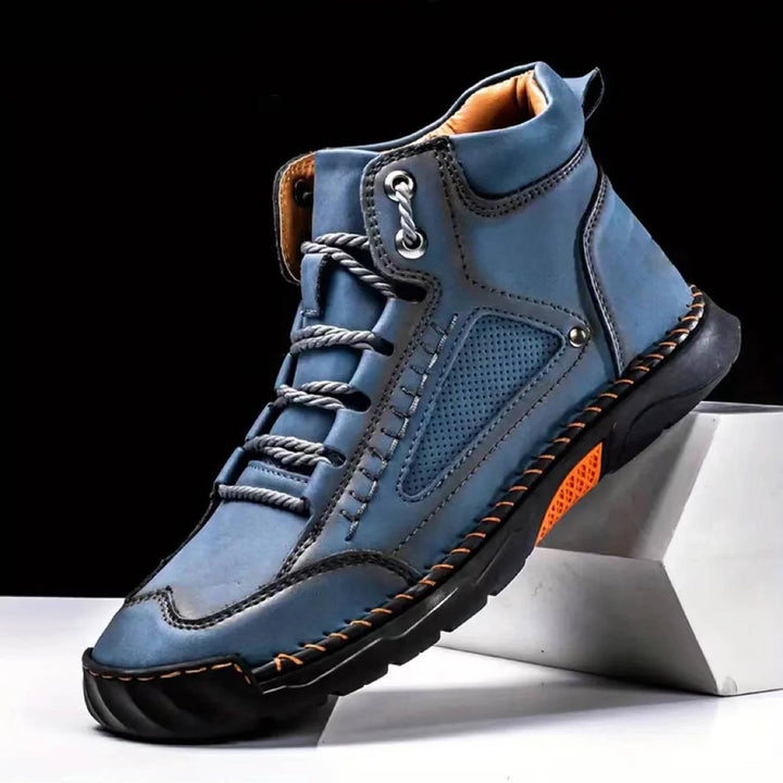 Front view of men's waterproof hiking boots, ideal for rugged terrain.