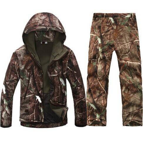 Men's waterproof tactical hunting jacket and pants set in olive for outdoor adventures