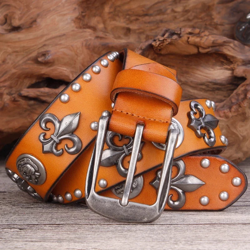 Stylish men's leather western belt, adorned with studs & a striking Fleur-de-Lis buckle, rugged cowboy accessory.