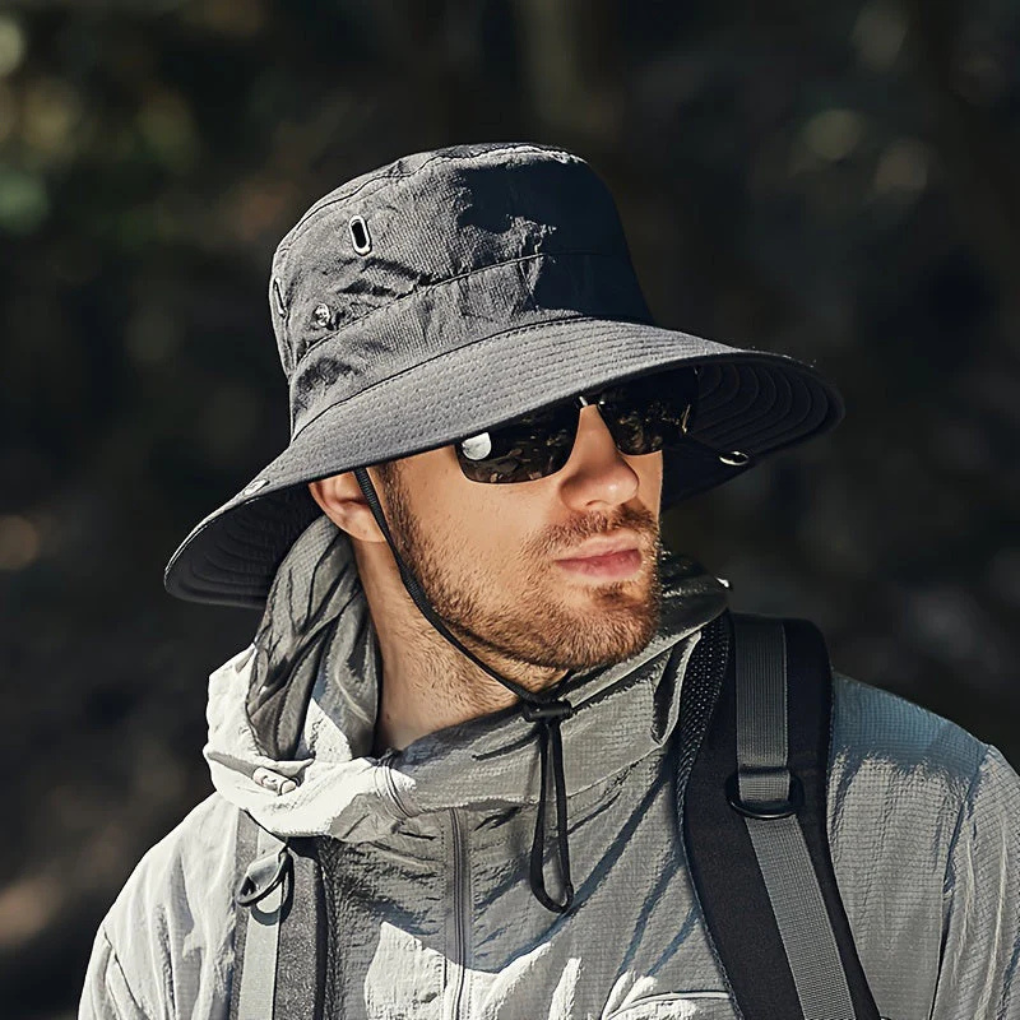 Men's wide brim sun hat with chin strap for UV protection during hiking, fishing, and beach activities. Breathable summer hat.