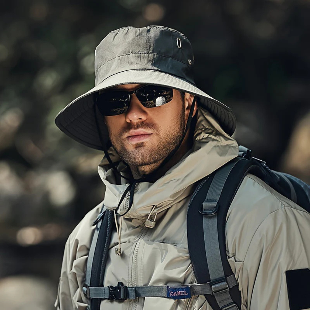 Breathable men's wide brim sun hat with chin strap, ideal for fishing, hiking, travel & beach. Great summer UV protection.