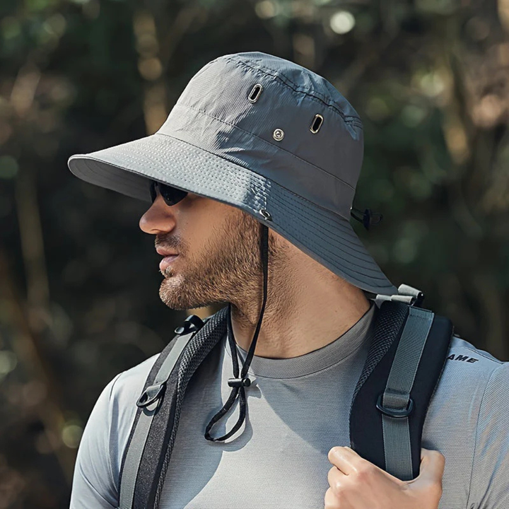 Stylish men's wide brim outdoor hat with secure chin strap. Excellent UV sun protection for hiking, beach & travel. Breathable.