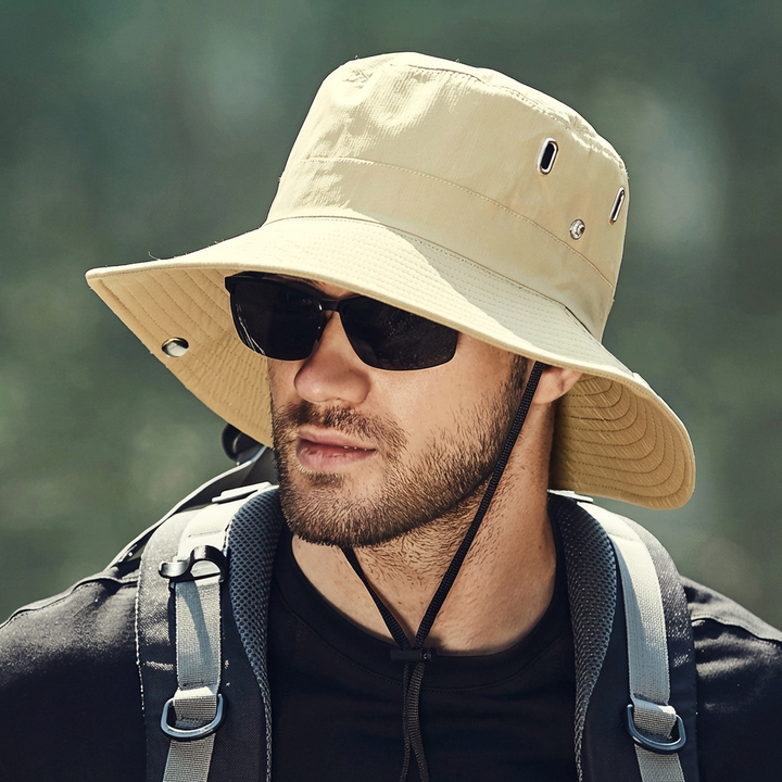 Versatile men's wide brim sun hat. Chin strap for security. Perfect for hiking, beach, fishing, travel. Offers UV protection.
