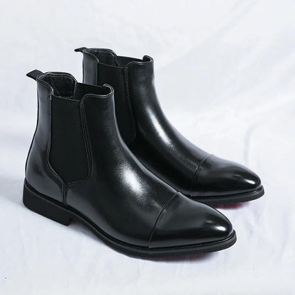 Stylish brown leather Chelsea boots for men, slip-on ankle fashion.