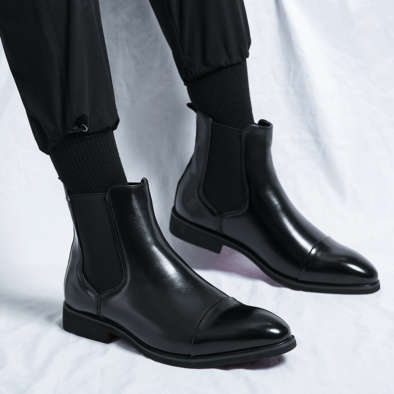 Classic black Chelsea boots for men, versatile ankle boots for any occasion.