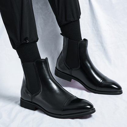Classic black Chelsea boots for men, versatile ankle boots for any occasion.